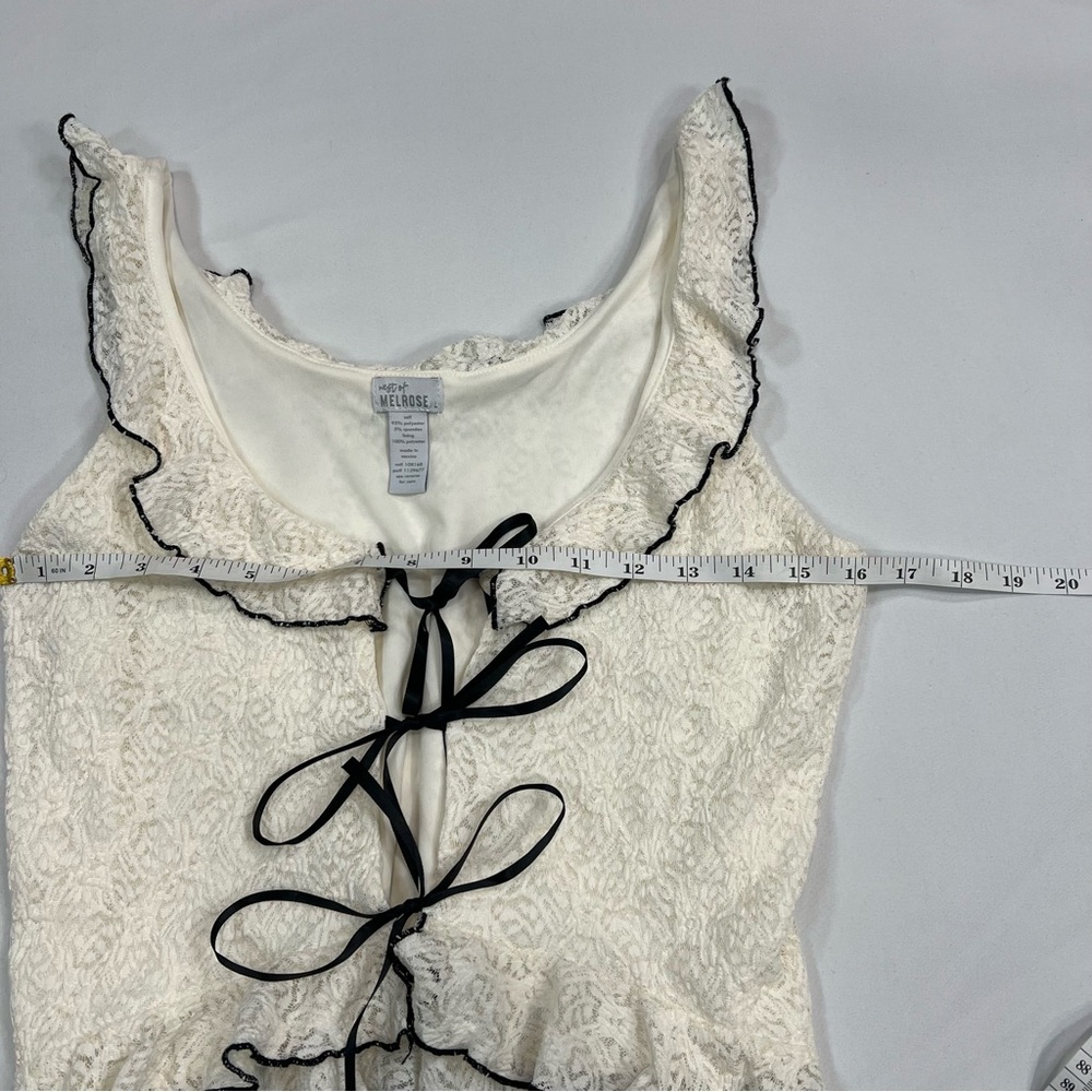 Elegant Cream Lace Crop Top with Black Trim - Picture 5 of 5